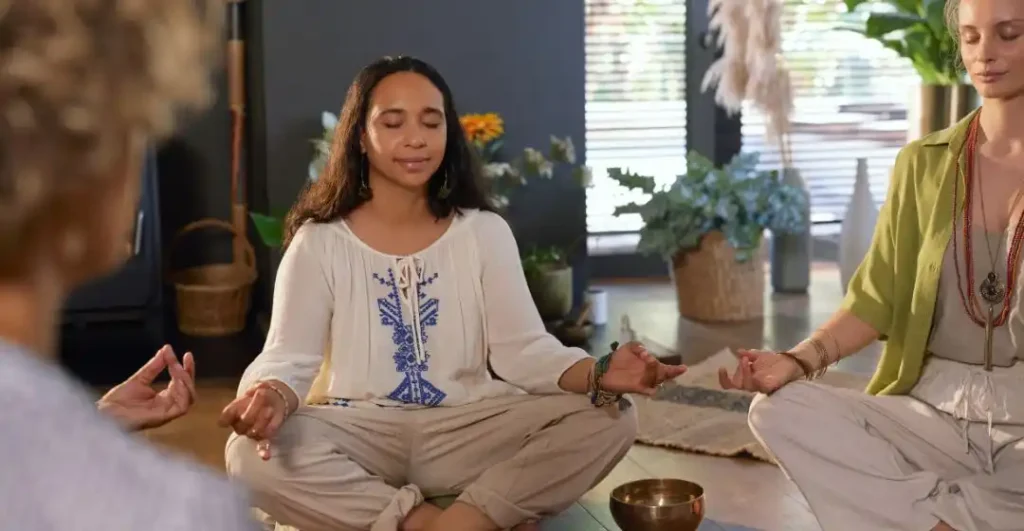 A woman practicing mantra healing during quiet reflection